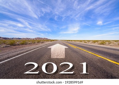 2021 New Year And Arrow On The Road Background With Blue Sky