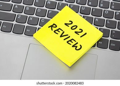 2021 Review on Adhesive Note on top of laptop