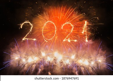 2021 written with Sparkle firework on black background, happy new year - Shutterstock ID 1876947691