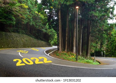 2022 to 2025 on highway road and white marking lines in the forest, Happy new year and road to success concept