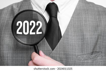 2022 Acronym Of Master Of Business Administration Degree. Education Concept. Businessman Hands With Magnifier.