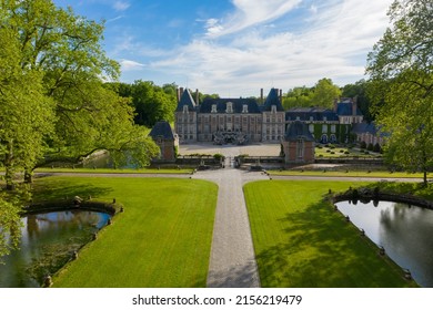 PARIS, FRANCE - MAI 12, 2022: Beautiful Medieval Castle. Aerial View Shot Of Castle. Château De Courances (Domaine De Courances). French Castle - PARIS, FRANCE - MAI 12, 2022. 