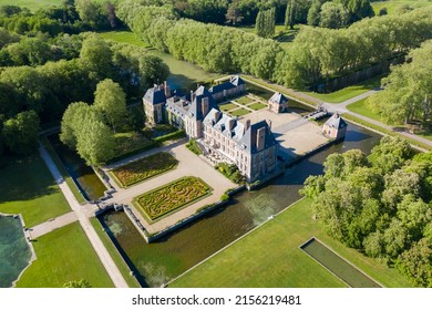 PARIS, FRANCE - MAI 12, 2022: Beautiful Medieval Castle. Aerial View Shot Of Castle. Château De Courances (Domaine De Courances). French Castle - PARIS, FRANCE - MAI 12, 2022. 