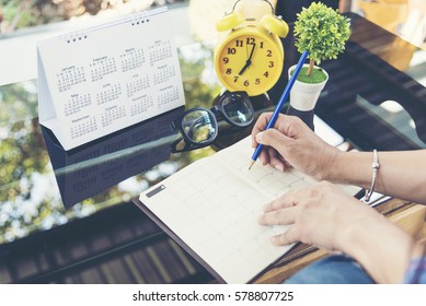 2022 Calendar Event Planner Timetable Agenda Plan On Organize Schedule Event. Wedding Planner Agenda Organizing Timetable By Organizer Schedule. Woman Hands Note On Calendar Desk. Calendar Event Plans