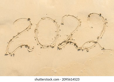 2022 Figures On Sandy Beach, New Years Eve Background 2022 New Year Concept