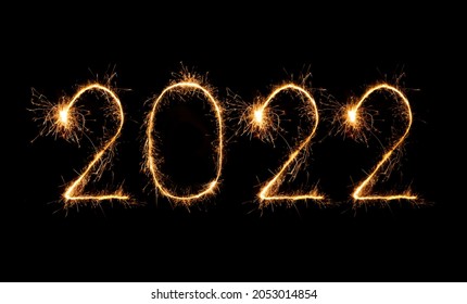 2022 happy new year fireworks written sparkling sparklers at night