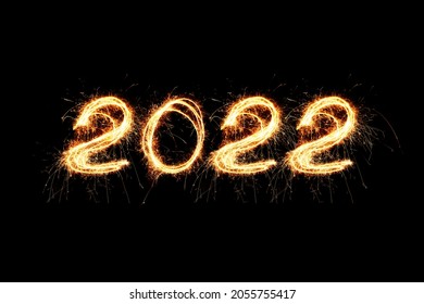 2022 happy new year fireworks written sparkling sparklers at night. Holiday 2022 Wallpaper Concept