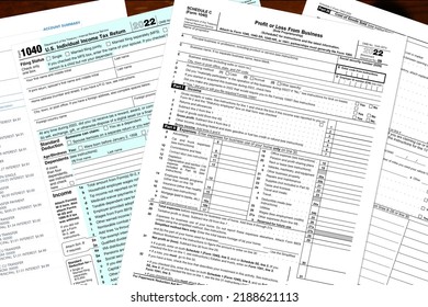 2022 IRS Tax Forms On A Desktop.