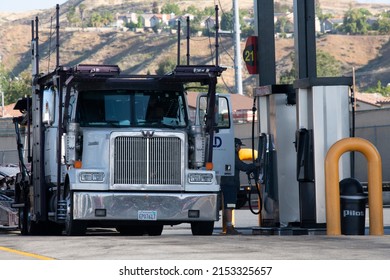 2022 May USA: Driver Of A Big Rig Truck Fueling At A Pilot Truck Stop In California. 