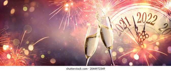 2022 New Year Celebration - Countdown And Toast With Champagne And Fireworks On Abstract Defocused Background - Shutterstock ID 2044972349