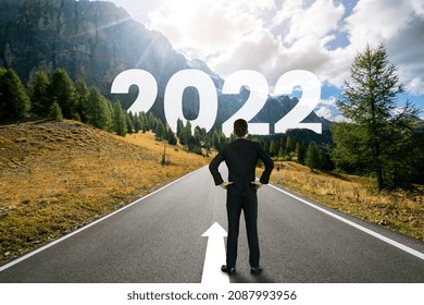 The 2022 New Year Journey And Future Vision Concept . Businessman Traveling On Highway Road Leading Forward To Happy New Year Celebration In Beginning Of 2021 For Fresh And Successful Start .