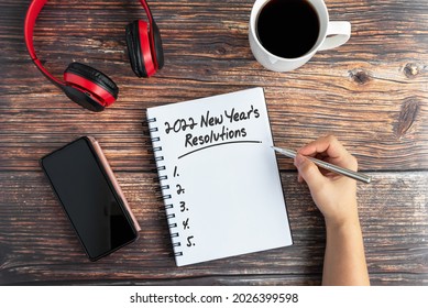 2022 New Year's Resolutions Text On Note Pad - New Year Concept