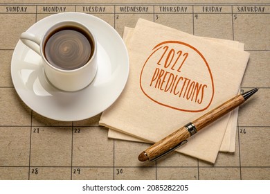 2022 predictions - handwriting on a napkin with a cup of coffee, business and financial trends and expectations in New Year - Shutterstock ID 2085282205