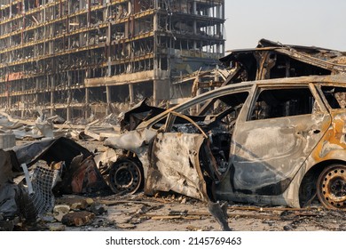 2022 Russian invasion of Ukraine war torn city destroyed car burn out. Aftermath shell of civilian bombed city damage car. Bomb attack Russia war damage Ukraine city war destruction Russian aggression