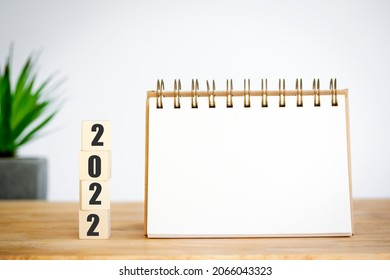 2022 Time To Start Up, Plan For New Year With Cubes Wooden, Space For Your Text On Notepad, Mockup Calendar And Tree Is Next, Mean To Growth Start New In Your Life.