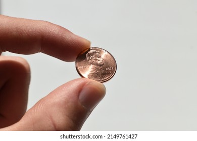 2022 U.S. Penny Close Up In Fingers  - Shutterstock ID 2149761427