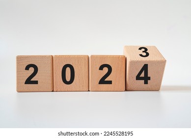 From 2023 to 2024. Merry Christmas and Happy New Year, White background.2024 new year idea concept. - Shutterstock ID 2245528195