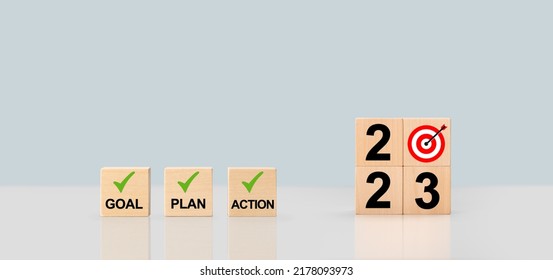 2023 Action Plan. Cubes with text 2023, plan, goal, action. to do list and plan for next year. wooden cubes with 2023, plan, goal, action. Development to success and motivation. - Shutterstock ID 2178093973