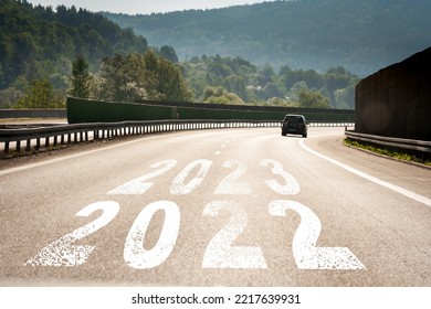2023 anniversary. Transition from 2022 to the new year. asphalt road and New year 2023 concept. 2023 written on highway road. Concept for vision new year 2023. - Shutterstock ID 2217639931