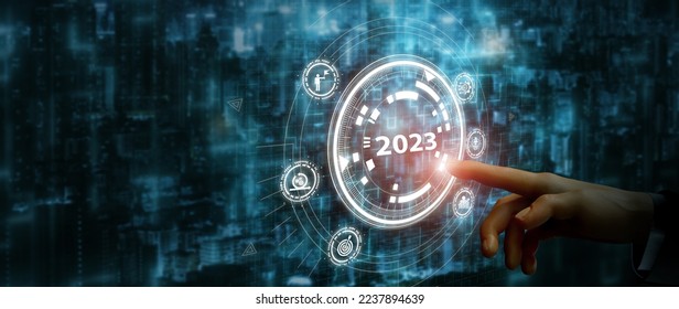 2023 automation technology and business transformation, adaptation, changing concept. Transform business model and automation strategy for thriving business. Finger about to press a button with 2023. - Shutterstock ID 2237894639