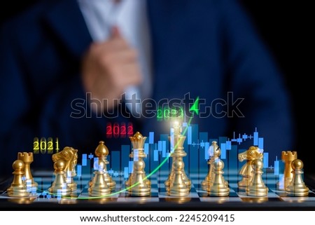 2023 business concept,New year 2023 or start straight concept,positive indicators in 2023,Businessman strategy 2023,Chess takes a strategic approach and tactics.