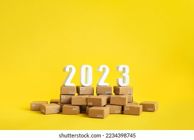 2023 Business ecommerce or export , import concepts with text number on product box order.marketplace and transportation service.copy space - Shutterstock ID 2234398745