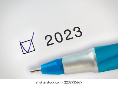 2023 Done concept. Check mark with hand drawn V mark in a box near the text 2023 year.