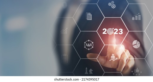 2023 Goal plan action, Business plan and strategies. Business annual plan and development for achieving golas. Goal acheiveement and success in 2023. Businessman showing 2023 business target icon. - Shutterstock ID 2174395017