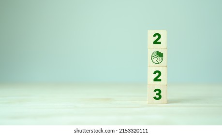 2023; Green Business, Enviromental Sustainability. Carbon Offset And Neutrality Strategies.  2023 Written On Wooden Cubes And Green Community. Goals,plan,opportunity, New Green Business And Social.