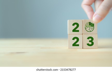 2023; Green Business, Enviromental Sustainability. Carbon Offset And Neutrality Strategies.  2023 Written On Wooden Cubes And Green Community. Goals,plan,opportunity, New Green Business And Social.