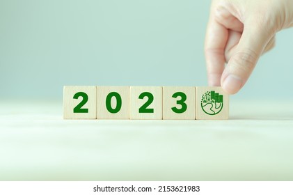 2023; Green Business, Enviromental Sustainability. Carbon Offset And Neutrality Strategies.  2023 Written On Wooden Cubes And Green Community. Goals,plan,opportunity, New Green Business And Social.