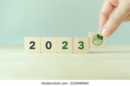 2023; Green Business, Enviromental Sustainability. Carbon Offset And Neutrality Strategies.  2023 Written On Wooden Cubes And Green Community. Goals,plan,opportunity, New Green Business And Social.