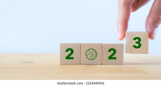 2023; Green Business, Enviromental Sustainability. Carbon Offset And Neutrality Strategies.  2023 Written On Wooden Cubes And Green Community. Goals,plan,opportunity, New Green Business And Social.