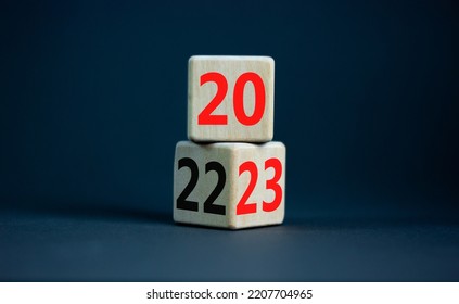 2023 happy new year symbol. Wooden cubes symbolize the change from 2022 to the new year 2023. Beautiful grey table grey background. Copy space. Business and 2023 happy new year concept. - Shutterstock ID 2207704965