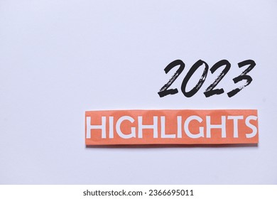 2023 Highlights inscription on white background. Best events of the year 2023, recap review assessment evaluation performance concept 