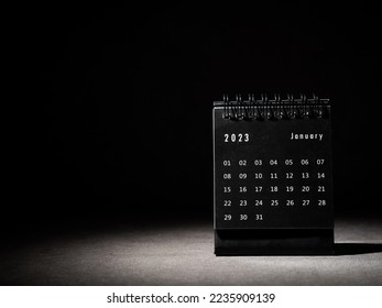 2023 January calendar on black background - Shutterstock ID 2235909139