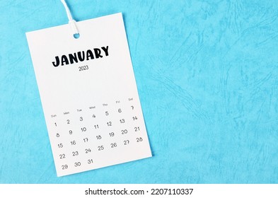 2023 January Calendar Page Hanged On White Rope  On Blue Background.