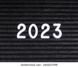 2023 message displayed on a felt letter board.
