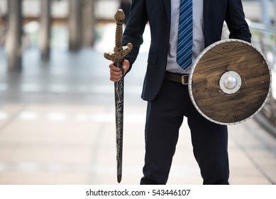 2023 New Year, Business Warrior, Business Man Holding Sword And Shield Get Ready To Fighting In Business War.