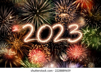 2023 New Year fireworks background, happy holidays and new year concept - Shutterstock ID 2228889659