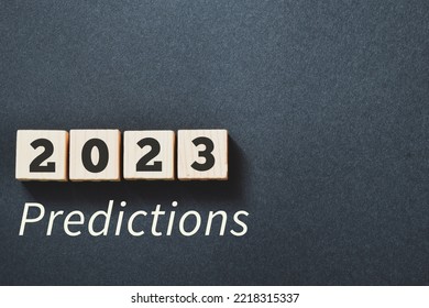 2023 Predictions expectations concept on wooden blocks on grey paper background. - Shutterstock ID 2218315337