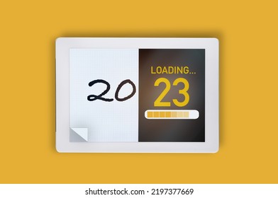 2023 traditional on white paper and artifical intelligence digital tablet technology on yellow background - Powered by Shutterstock