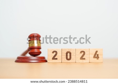 2024 block with judge gavel on table. Law, lawyer, judgment, justice auction and bidding concept