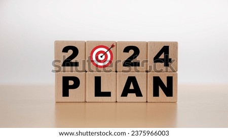 2024 goals of business plan and strategies. Wooden cubes with 2024 and goal icon. Goal acheiveement and success in 2024. Business common goals for planning new project, annual plan