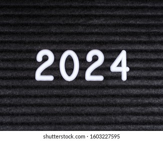 2024 message displayed on a felt letter board.
