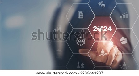 2024 new year goal plan action, Business plan and strategies. Annual plan and development for achieving golas. Goal achievement and success in 2024. Businessman showing 2024 business target icon.