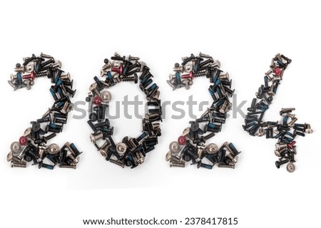 2024 written with metal tiny screws  ,  close up isolated on white.