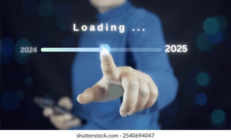 2025 business planning and strategy concept, Hand touching on download bar status to change from 2024 to 2025 for countdown of merry Christmas and happy new year by technology concept, 2025 trend