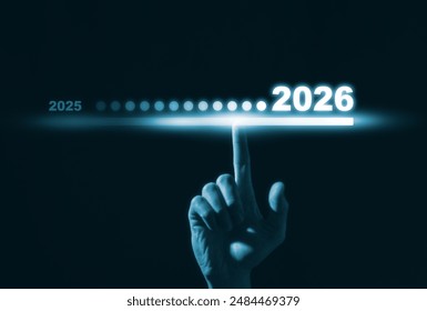 2026 business planning and strategy concept, Hand touching on download bar status to change from 2025 to 2026 for countdown of merry Christmas and happy new year by technology concept, 2026 trend - Powered by Shutterstock - Get 15% off with code: PIKWIZARD15