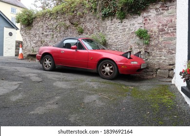 20th October 2020- An Old Mazda MX-5, Two Door Convertible Sports Car, Parked On A Quiet Street In The Ancient Township Of Laugharne, Carmarthenshire, Wales, UK.